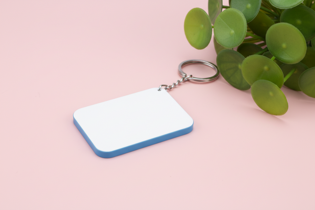 Keyring Polymer; colour edge (4.8cm x 6.7cm)