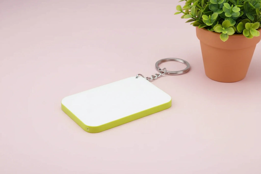 Keyring Polymer; colour edge (4.8cm x 6.7cm)